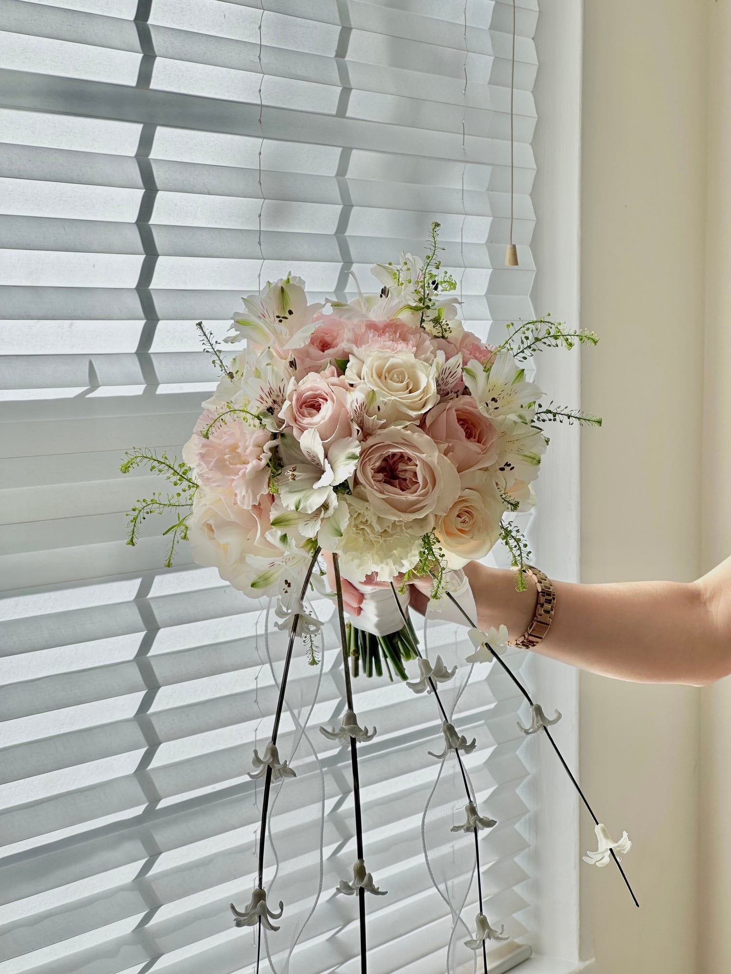 A bridal bouquet with airy drapes and delicate flow — perfect for a graceful walk down the aisle.