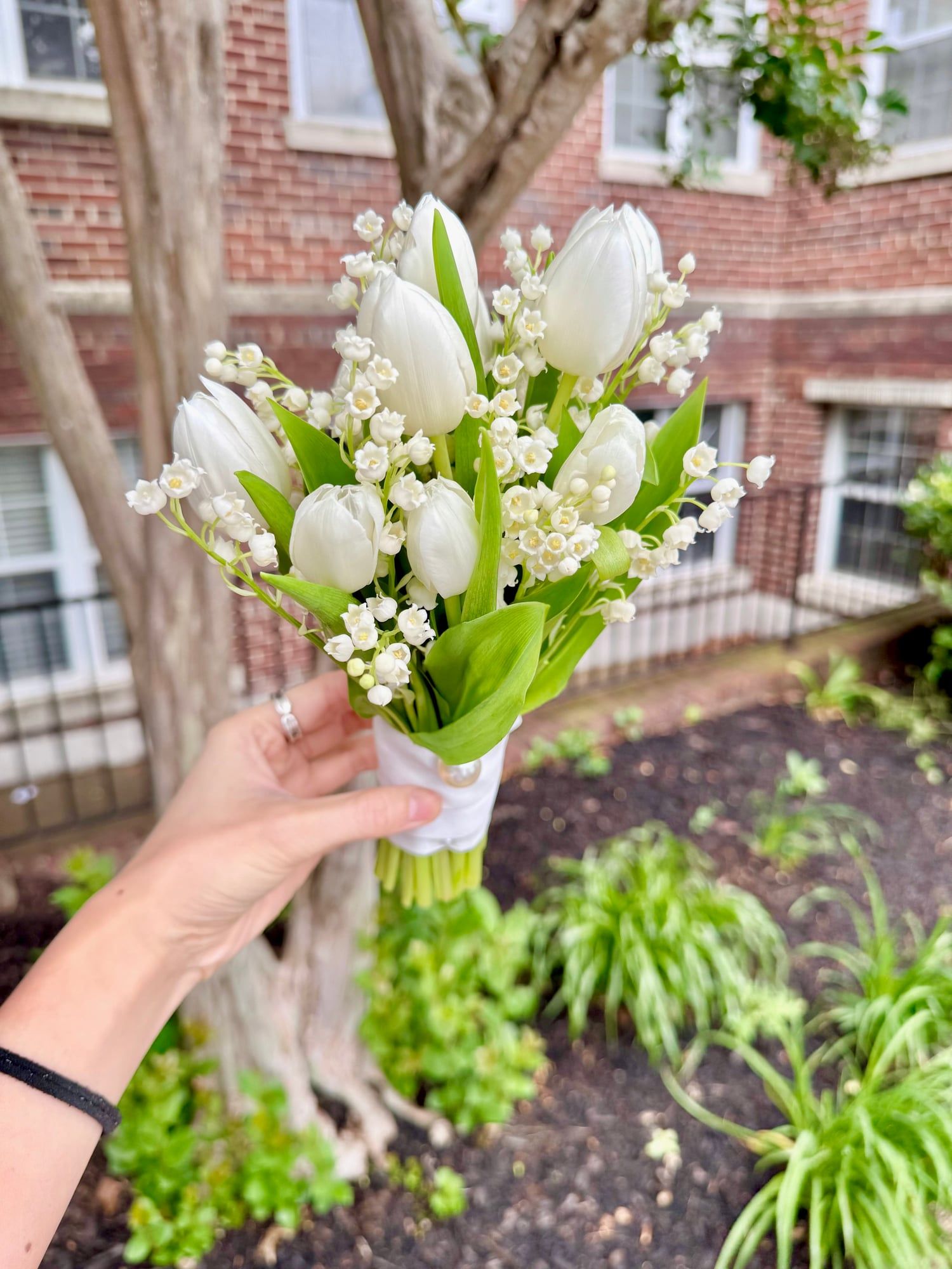 Symbolizing happiness and a return to sweetness, this bouquet blends tulip grace with the delicate charm of Lily of the Valley.