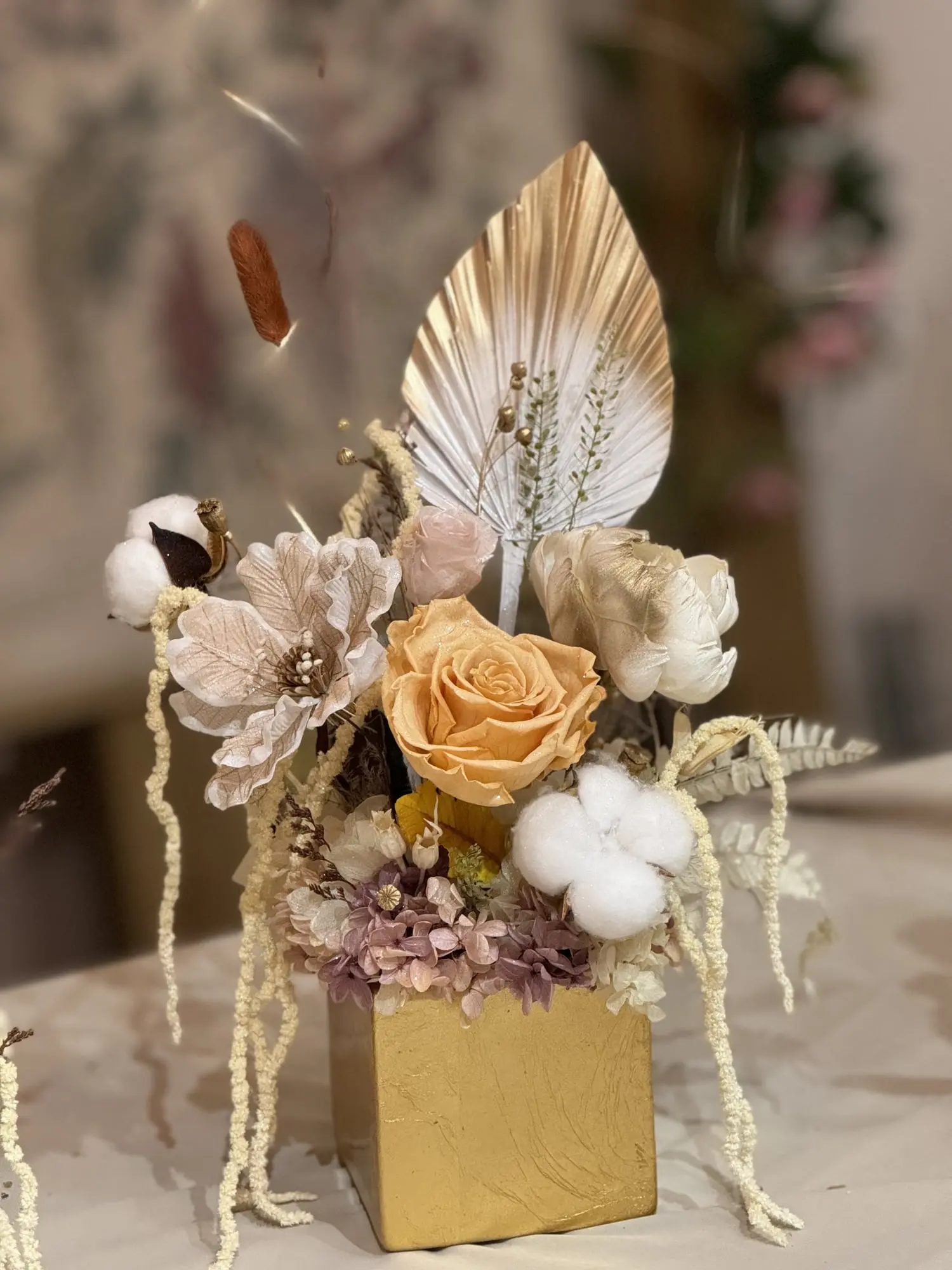 Elevate your space with this exquisitely crafted preserved flower arrangement.